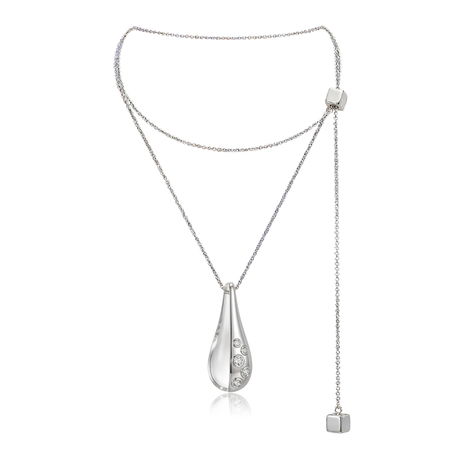 A silver and clear resin teardrop pendant necklace with a delicate chain, a second shorter chain, and a dangling chain ending in a small square charm, shown on a white background.